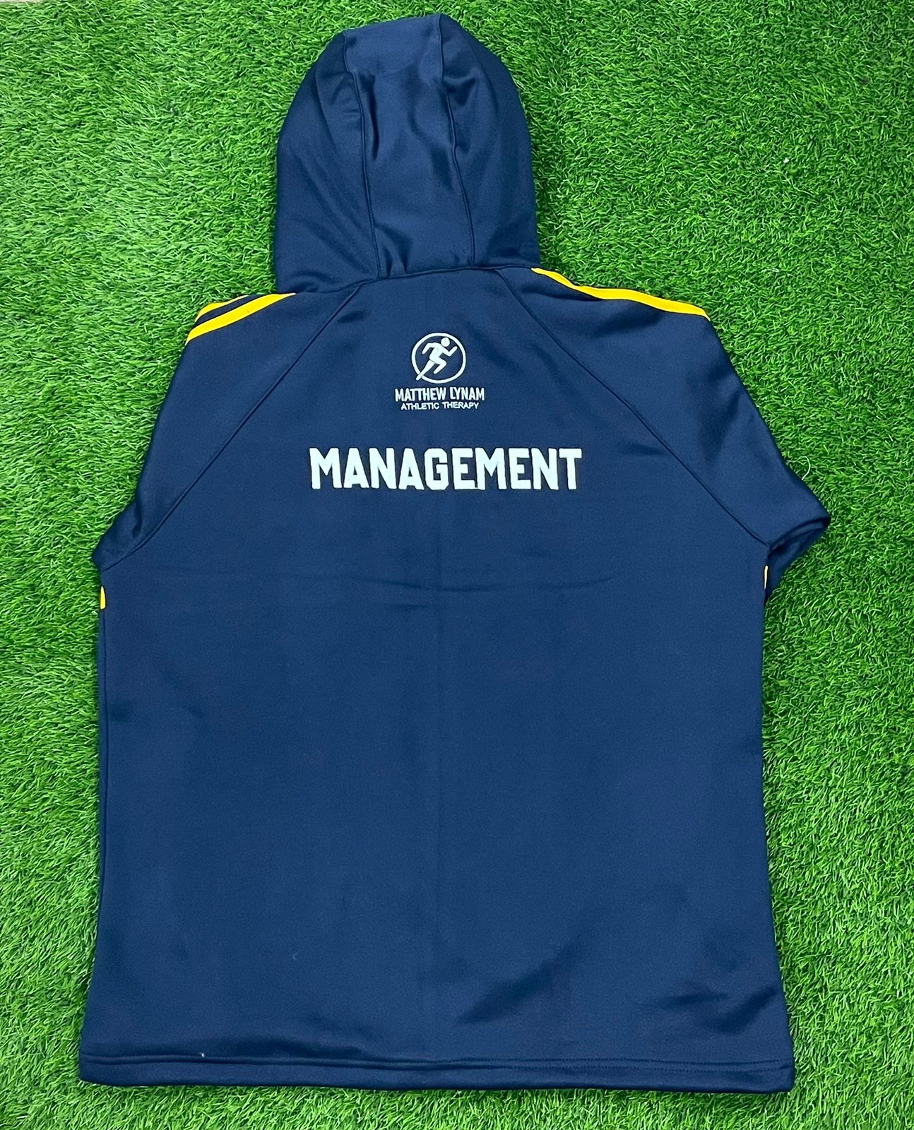 Navy team management top with personalised back